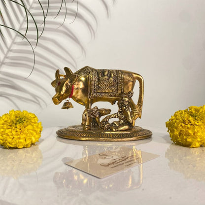 Sacred Kamdhenu cow with calf idol for prosperity and harmony
