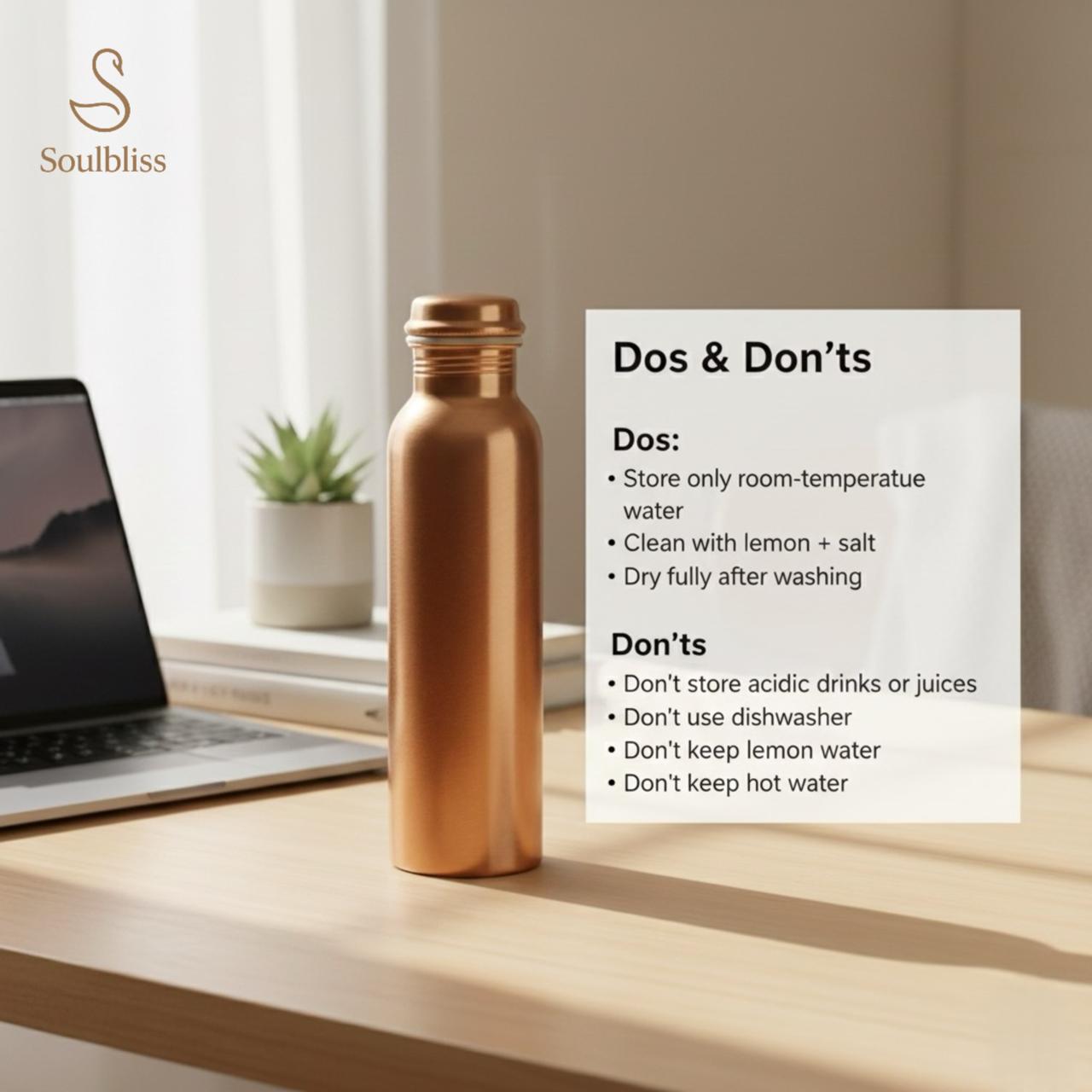 copper water bottle on a desk with a laptop and plant, featuring 'Soulbliss' branding.