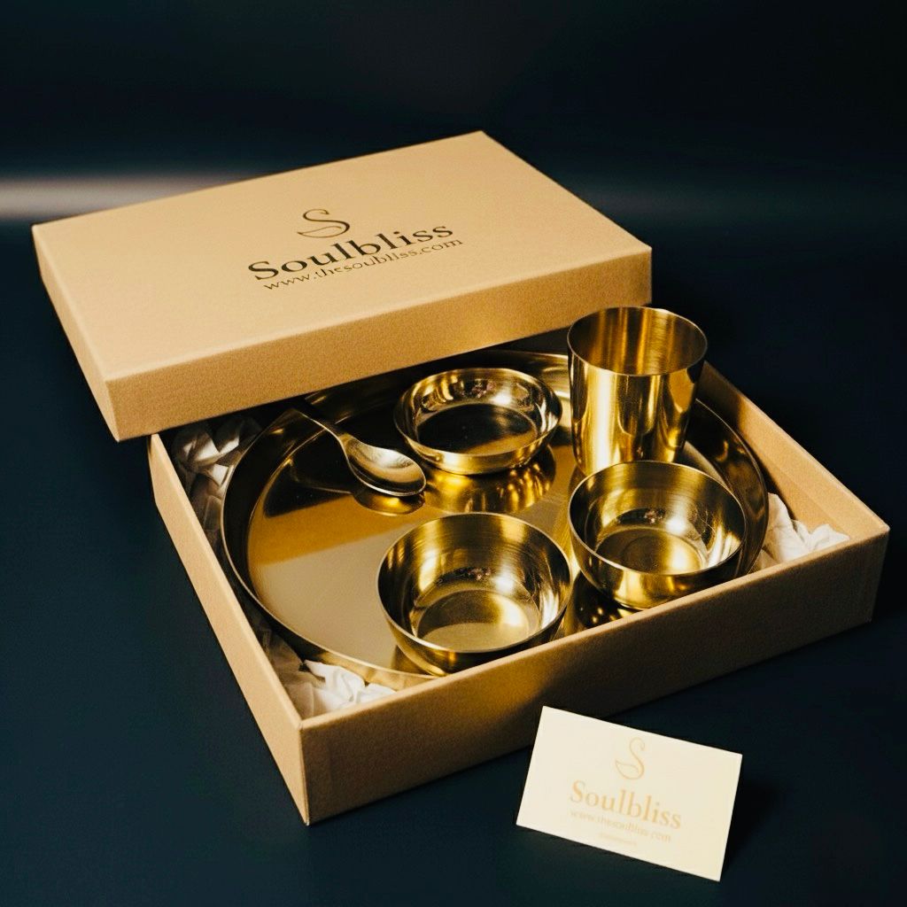 Set of gold bowls and cups in a box with 'Soulbliss' branding.