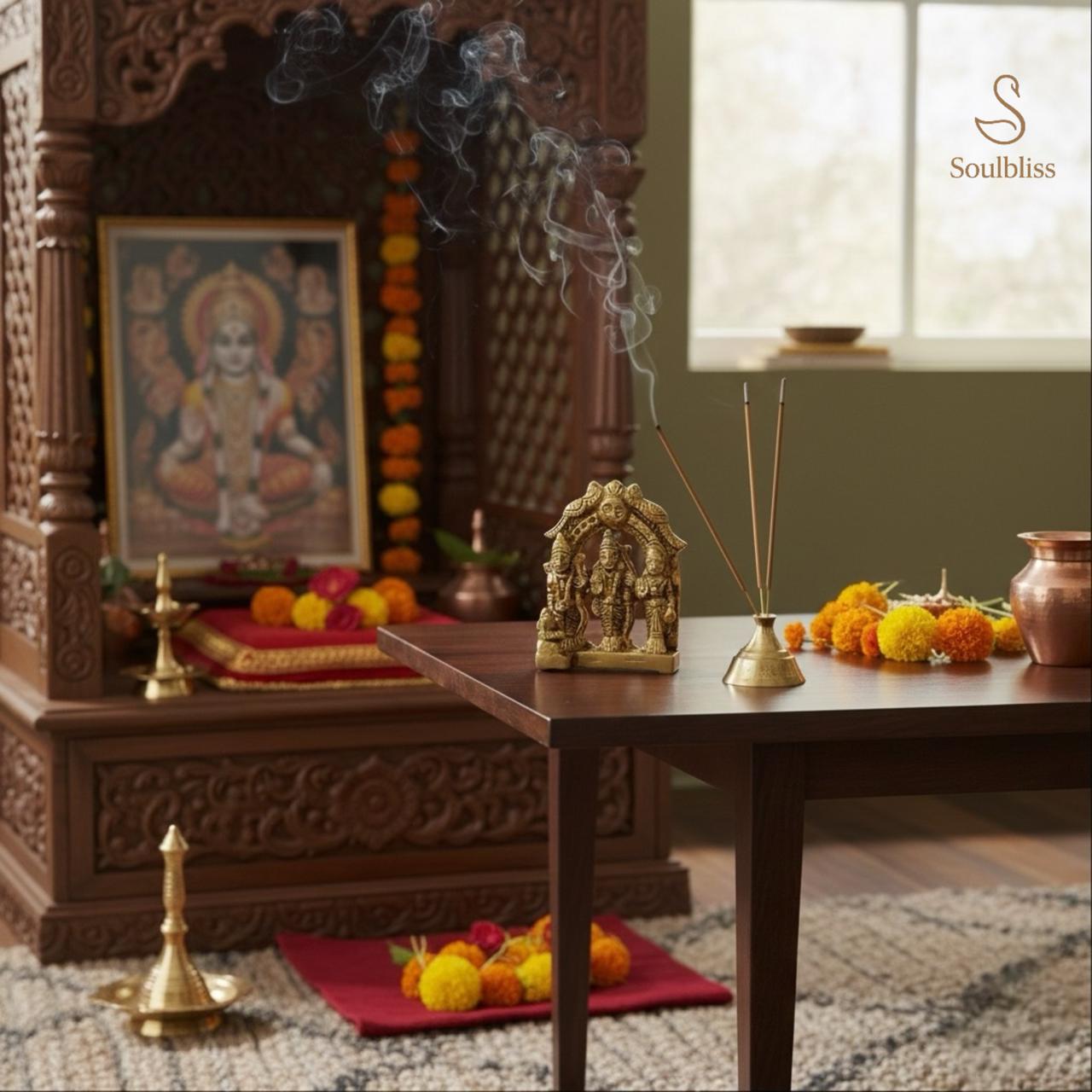 Pooja room with wooden altar, deity idol, and decorative elements. ram darbar idol brass 