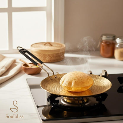 Bread being cooked on a stove with a 'Soulbliss' logo in the corner.