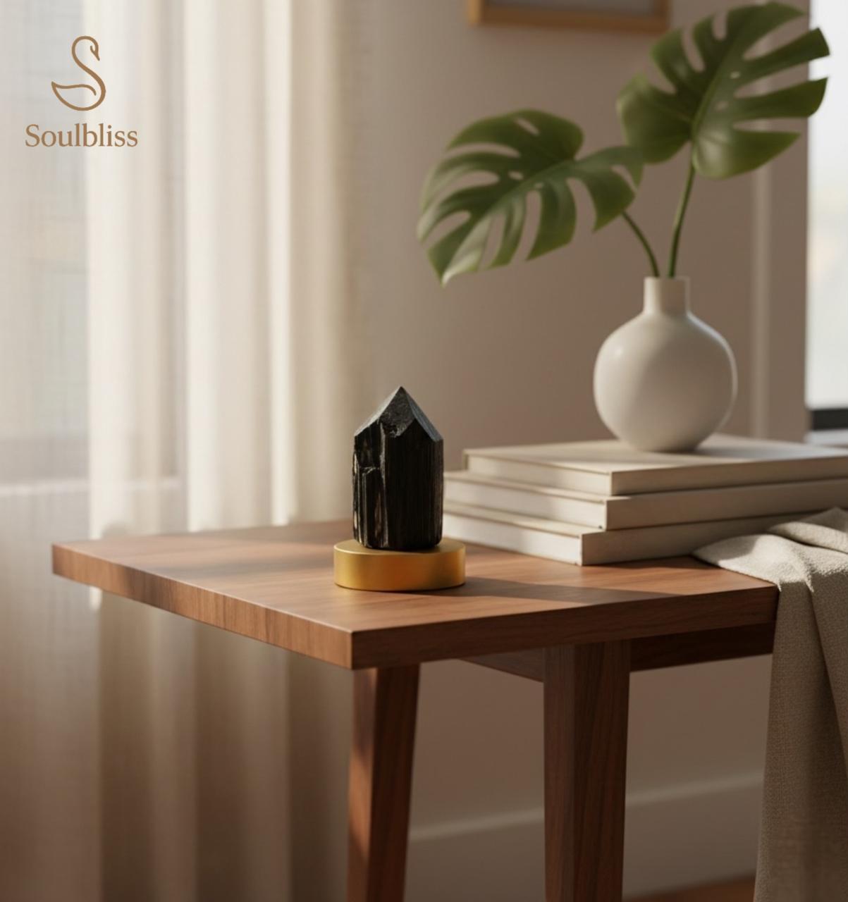 Wooden side table with decorative items including a vase and books, featuring the brand 'Soulbliss'.